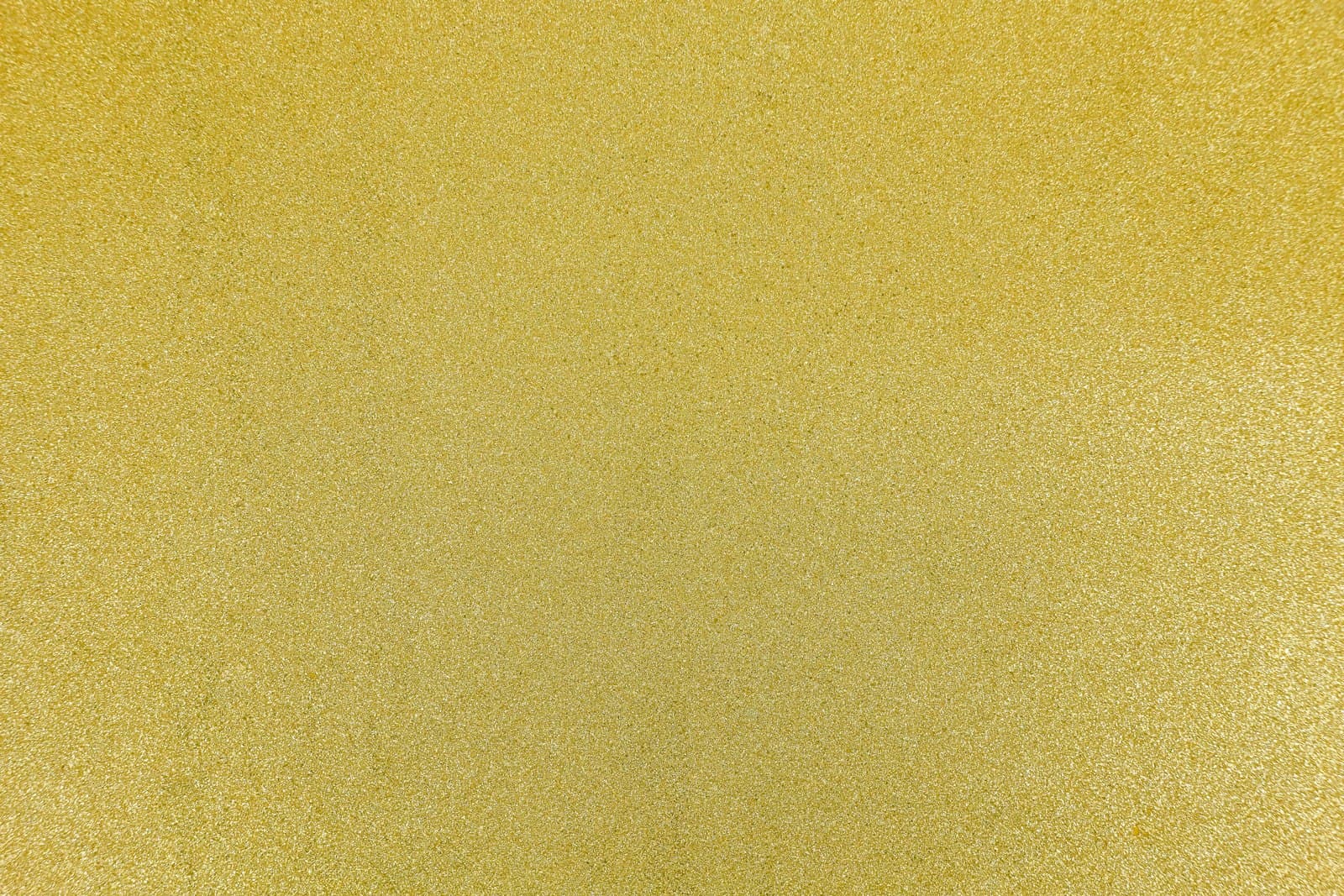 Close-up of a champagne-toned metallic mica wall covering