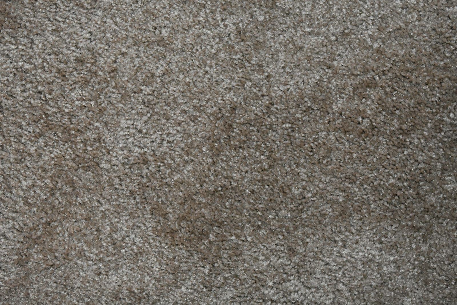 Close-up of a warm brown contract carpet texture