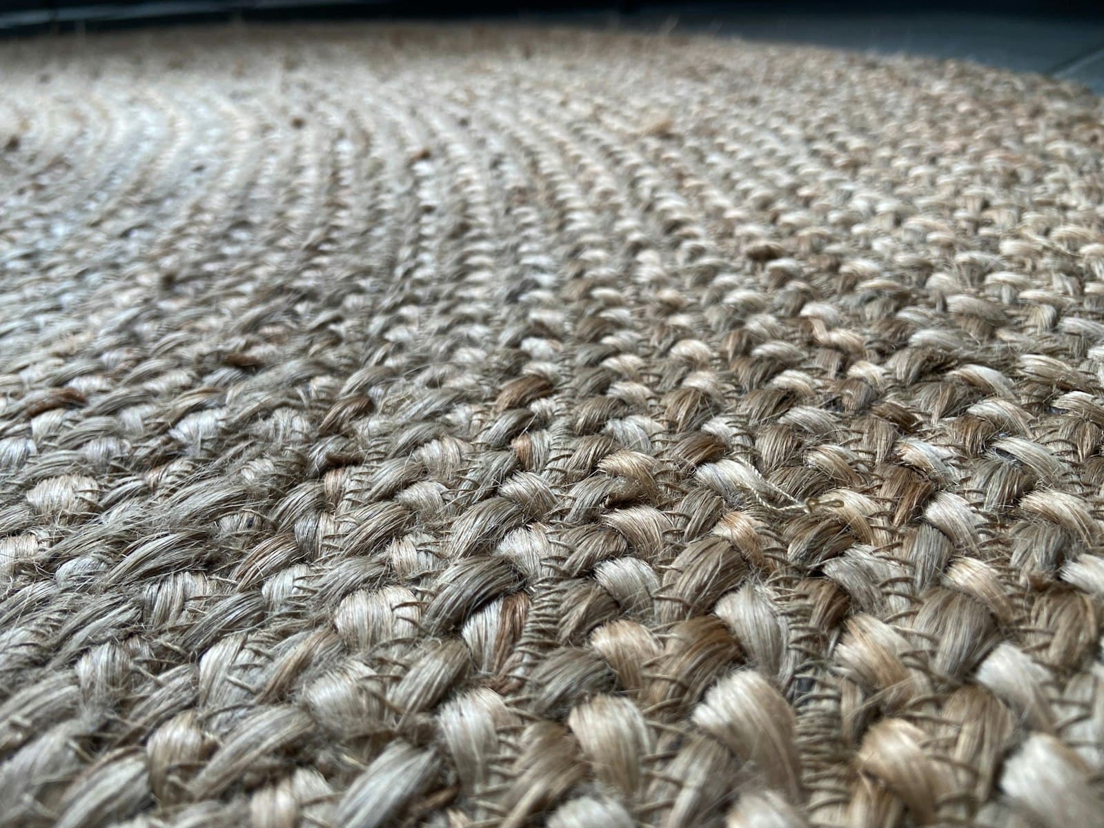 Close-up of a woven natural-fibre wall covering texture