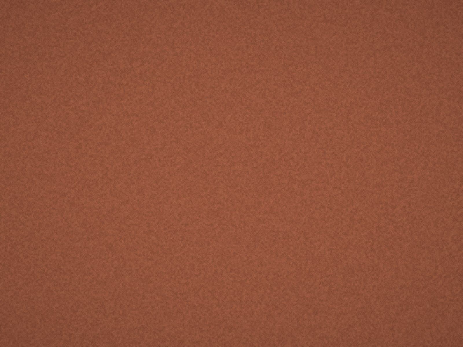 Close-up of a contract carpet tile in rust