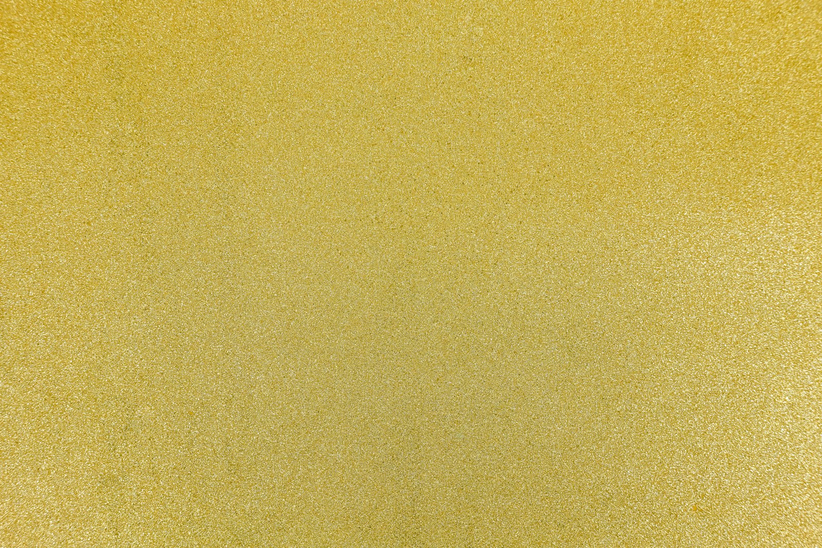 Close-up of a champagne-toned metallic mica wall covering